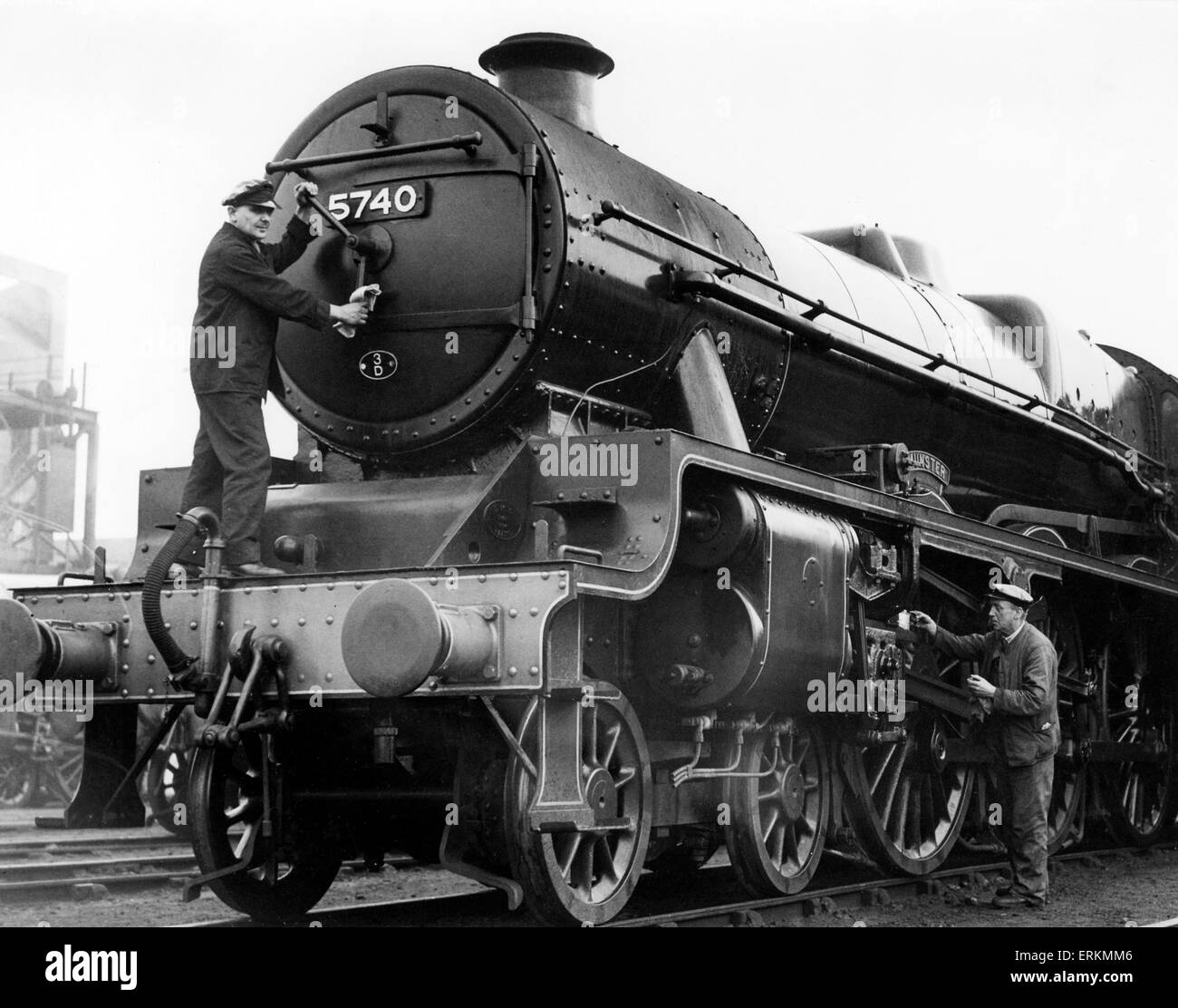 The London Midland and Scottish Jubilee Class steam locomotive 5740 Munster being prepared by workers for a night run. 2nd April 1940. Stock Photo