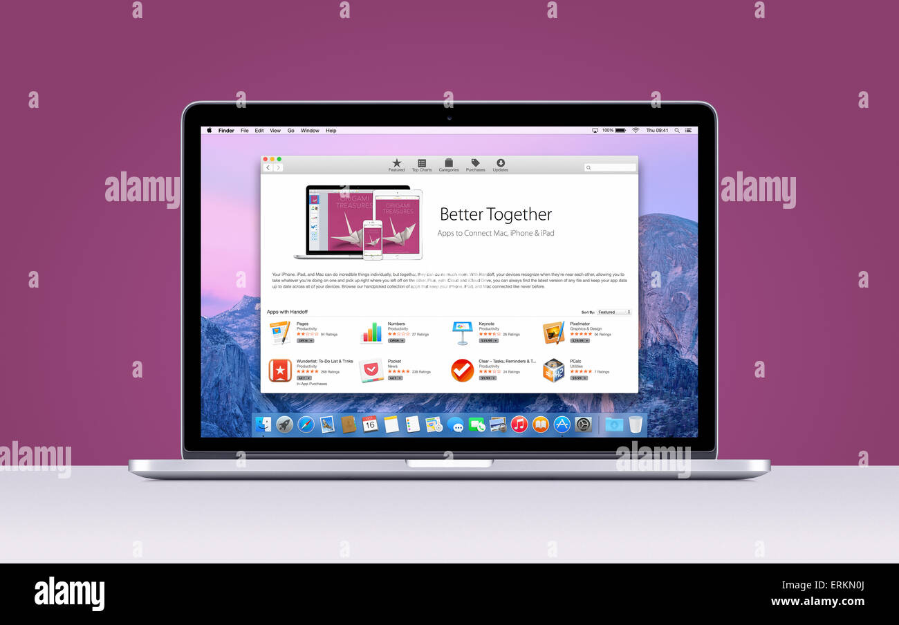 Directly front view of Apple MacBook Pro Retina with an open App Store on purple background. Varna, Bulgaria - November 03, 2013 Stock Photo