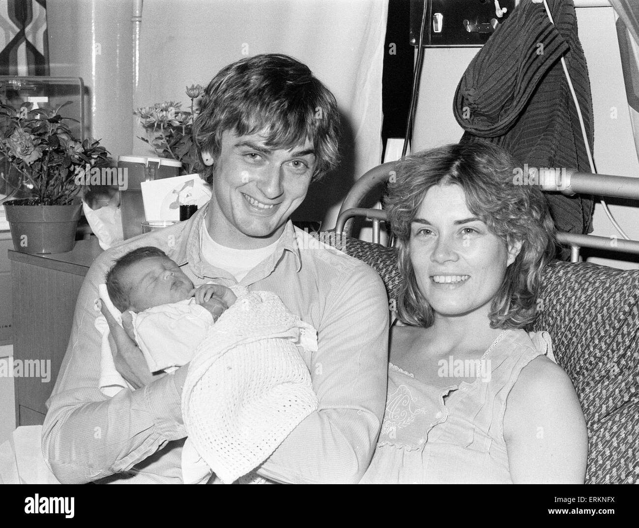 Mike Oldfield, musician and composer, pictured with newborn baby daughter Molly and partner Sally Cooper, 3rd December 1979. Stock Photo