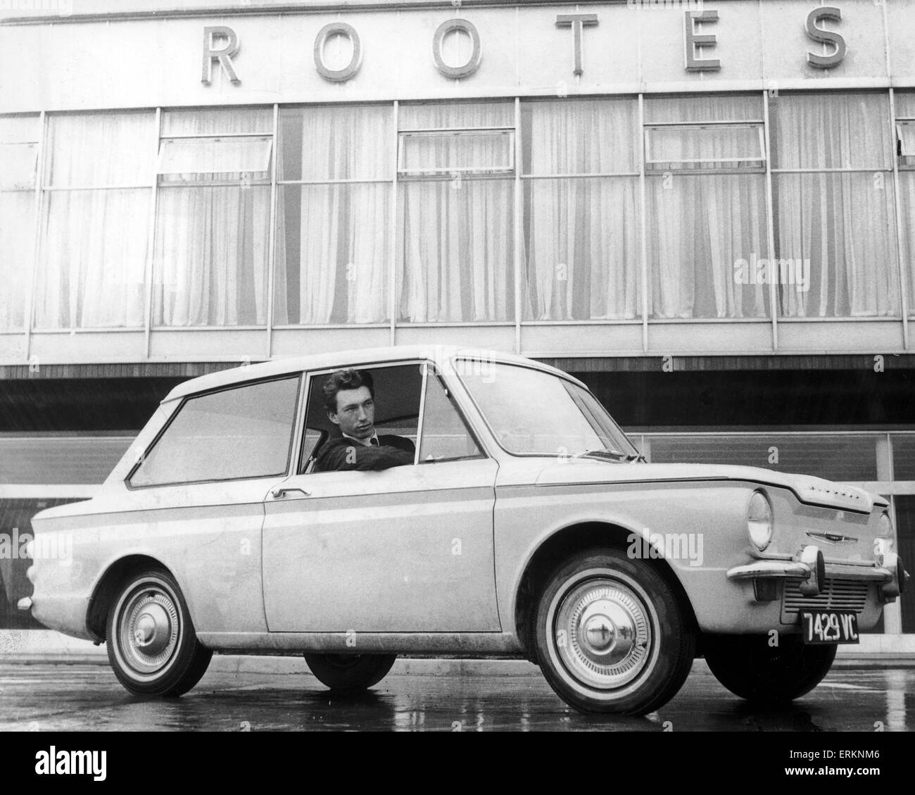 Hilman Imp car, positioned outside the Linford Factory that has been taken over my Rootes. 13th November 1964. Stock Photo