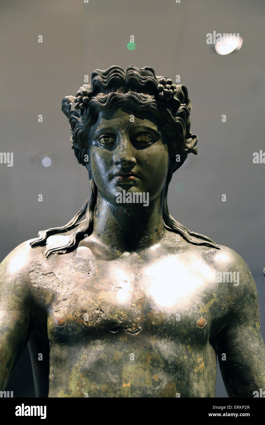 Dionysus with diadem adorned with vine shoots. Roman Period. Hadrianic period Ad 117-138. Bronze. National Roman Museum. Palace Stock Photo