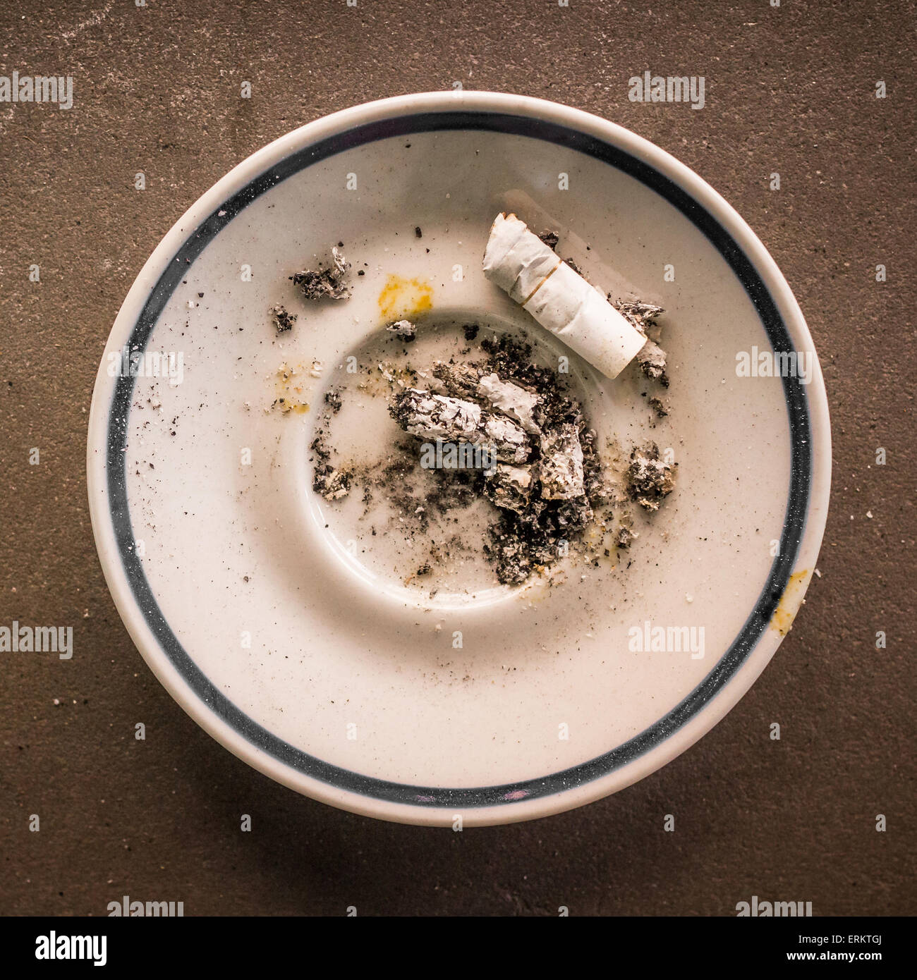 A saucer used as ashtrays Stock Photo Alamy