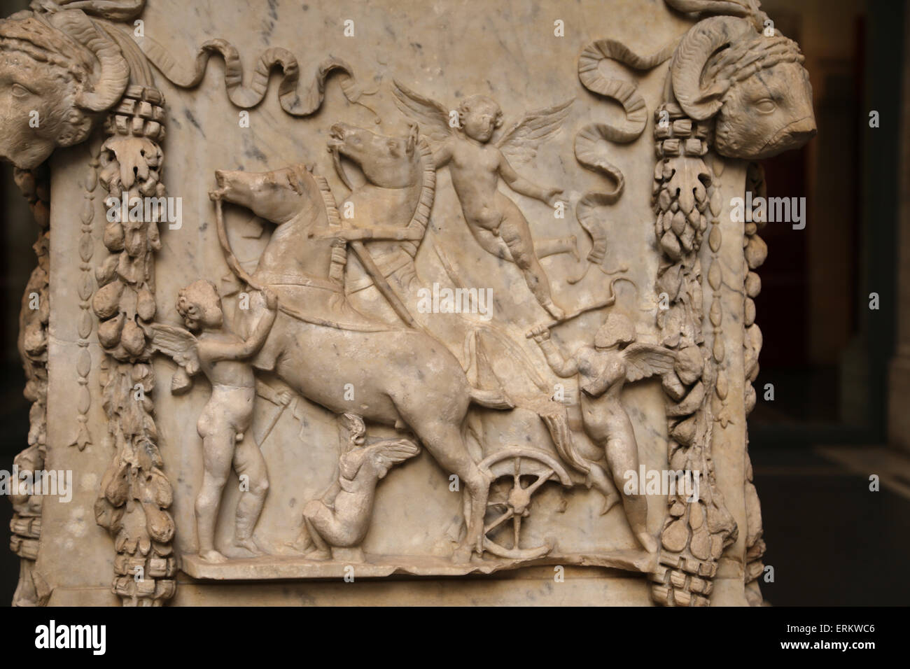 Altar dedicated to Mars and Venus. 1st C. From Ostia Antica. Relief. Cupid and Biga (October Horse). Animal sacrifice to Mars. Stock Photo