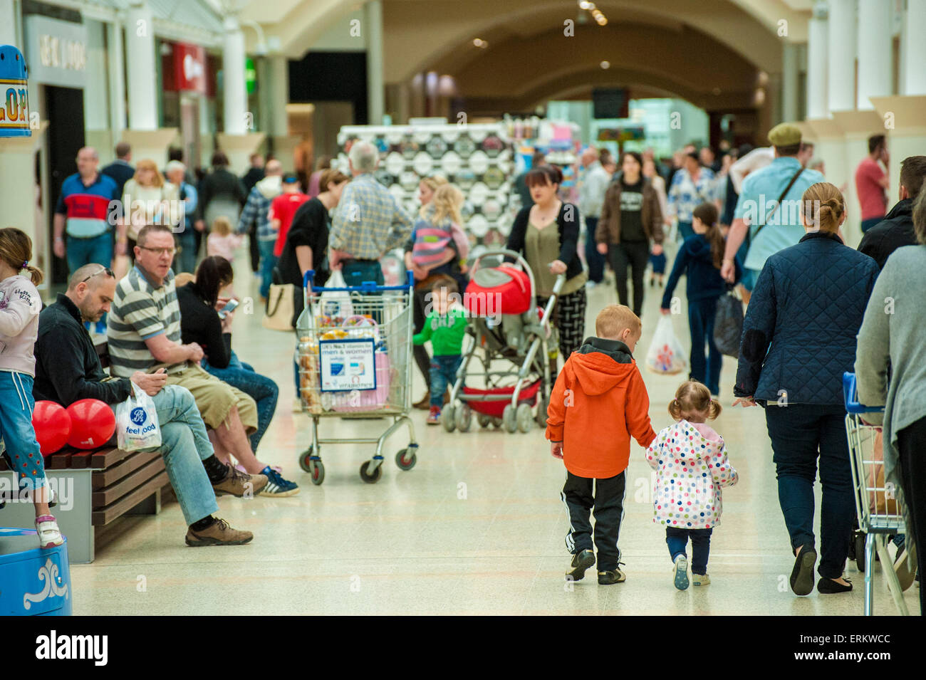 shoppers main thoroughfare Serpentine Green Shopping Centre, Peterborough PE7 8BE. The site is owned by British Land PLC. Stock Photo