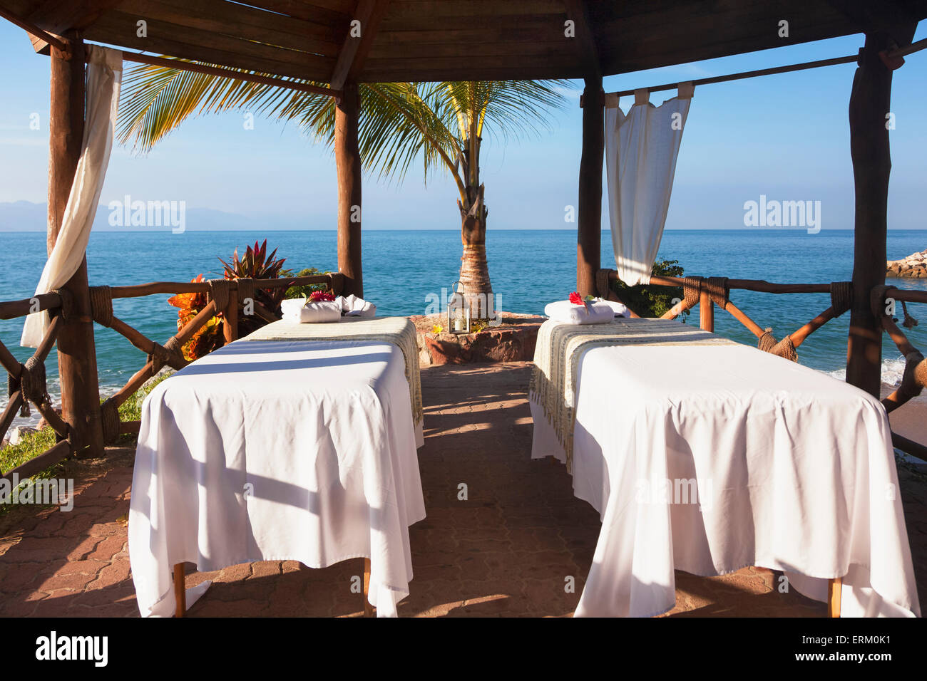 Couples massage tables set up on the beach; Puerto Vallarta, Jalisco