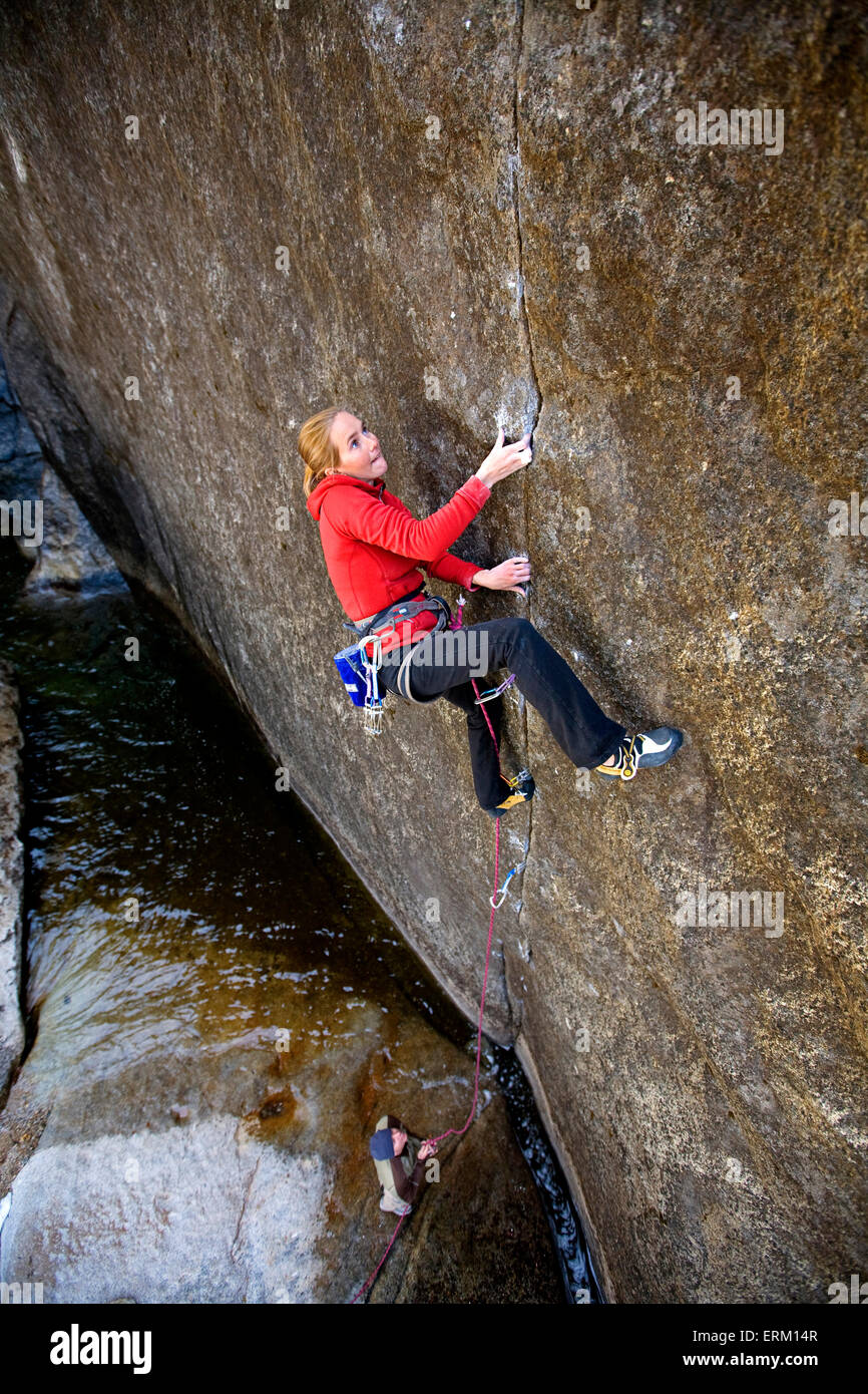 A woman climbing in Yosemite National Park Stock Photo Alamy
