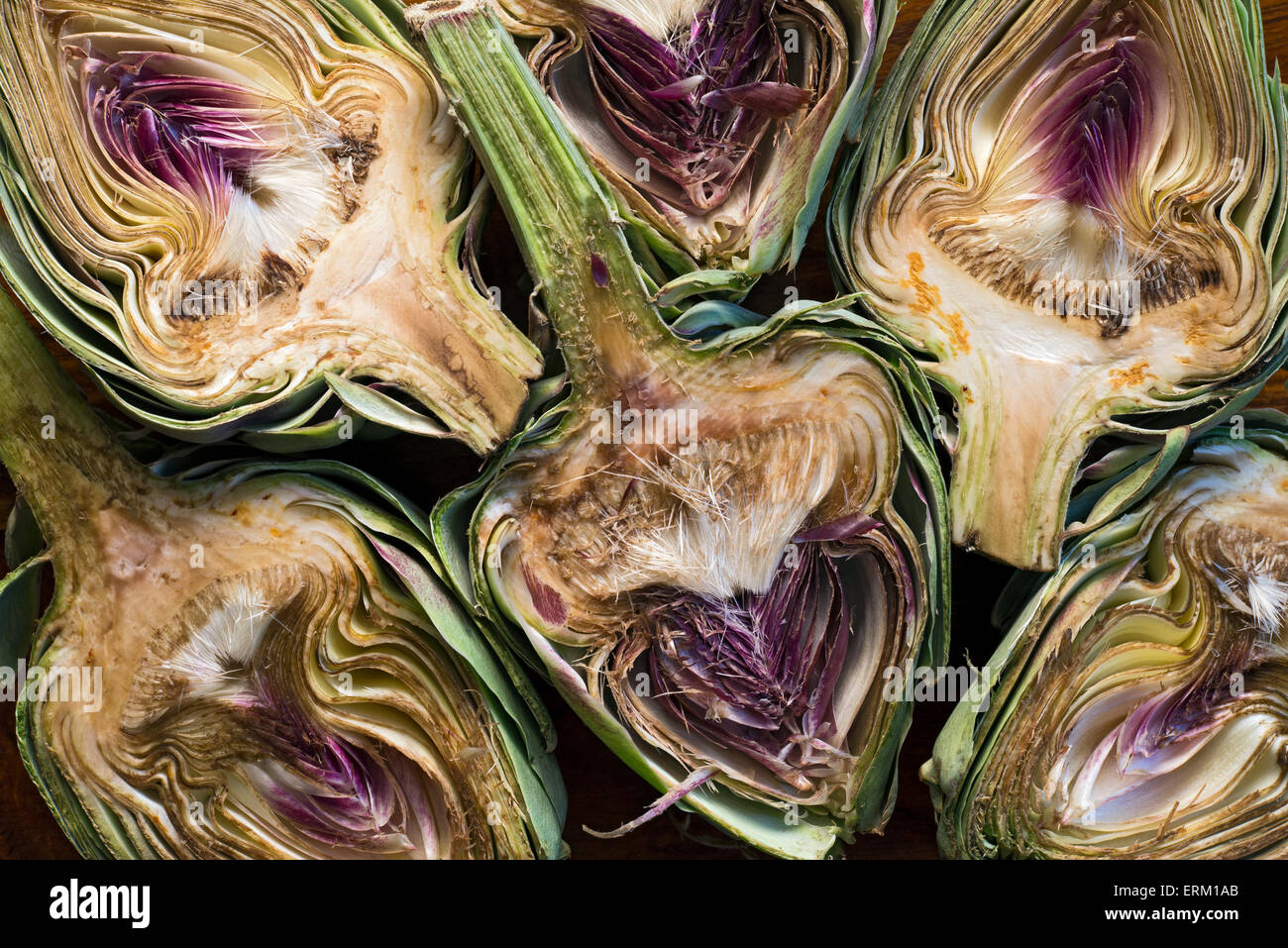 Background of various cuts artichokes Stock Photo