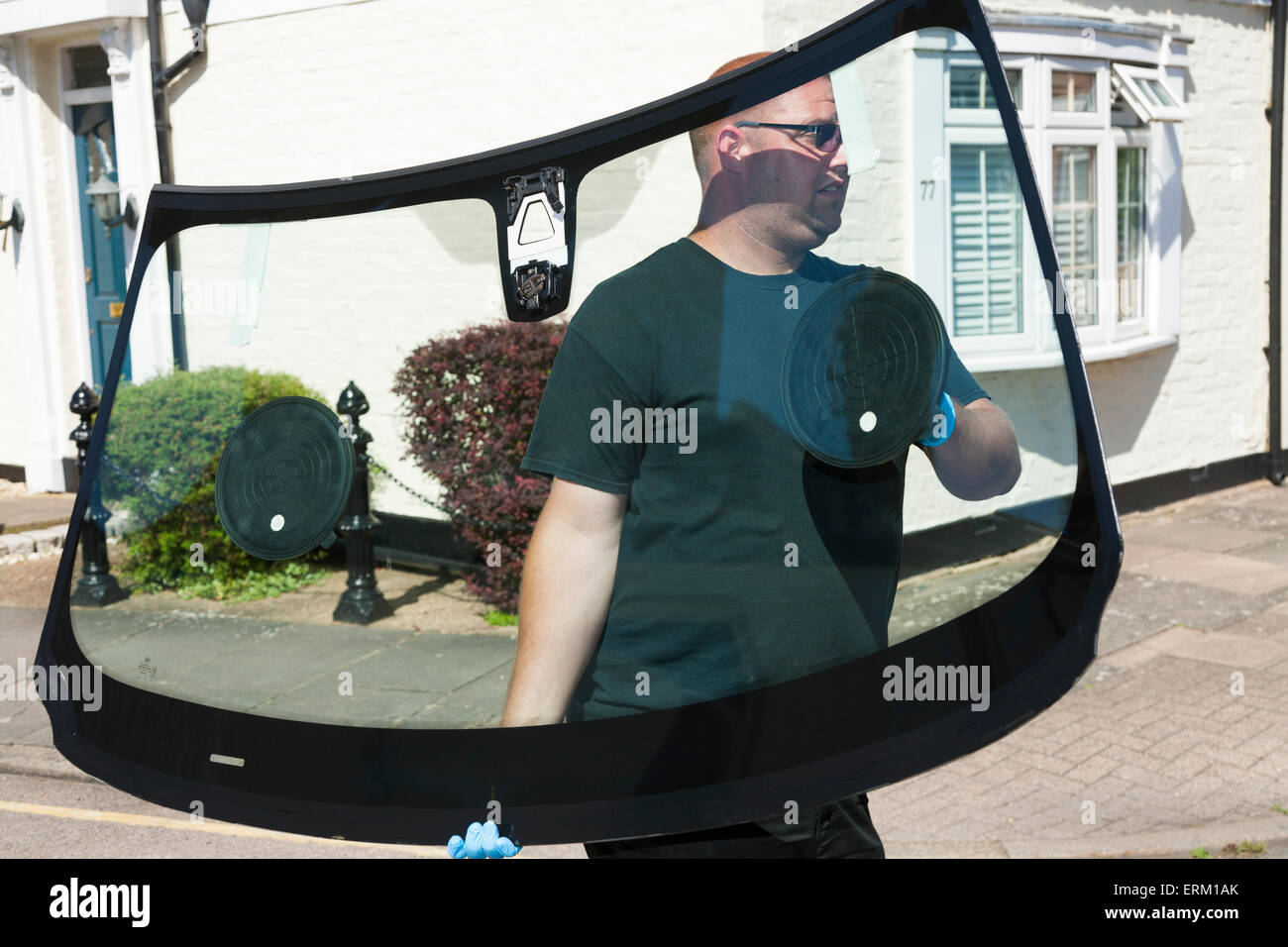 Windscreen fitter from ScreenTec Windscreens carrying / fitting a