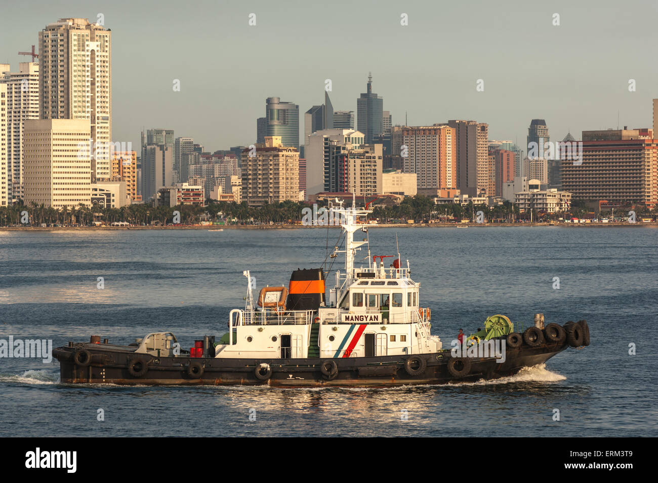 Skyline and port of Manila taken from the sea Stock Photo Alamy