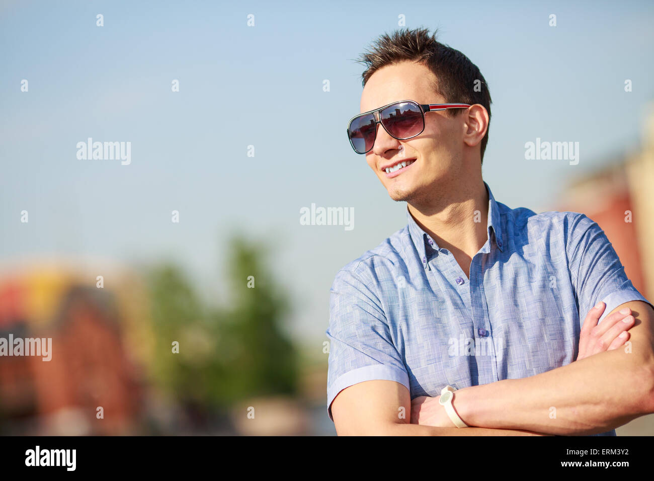portrait of a trendy young man in the city Stock Photo - Alamy