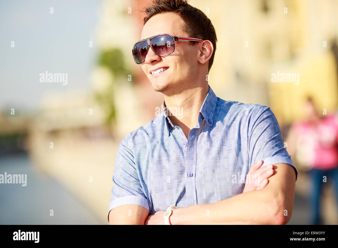 Elegant young man sunglasses hi-res stock photography and images - Alamy