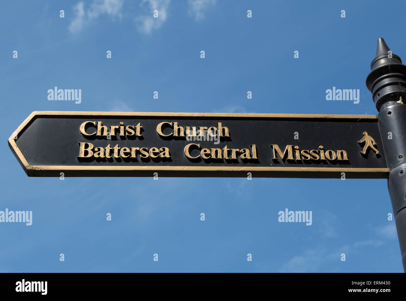 signpost in battersea high street, london, england, giving directions to christ church and battersea central mission Stock Photo