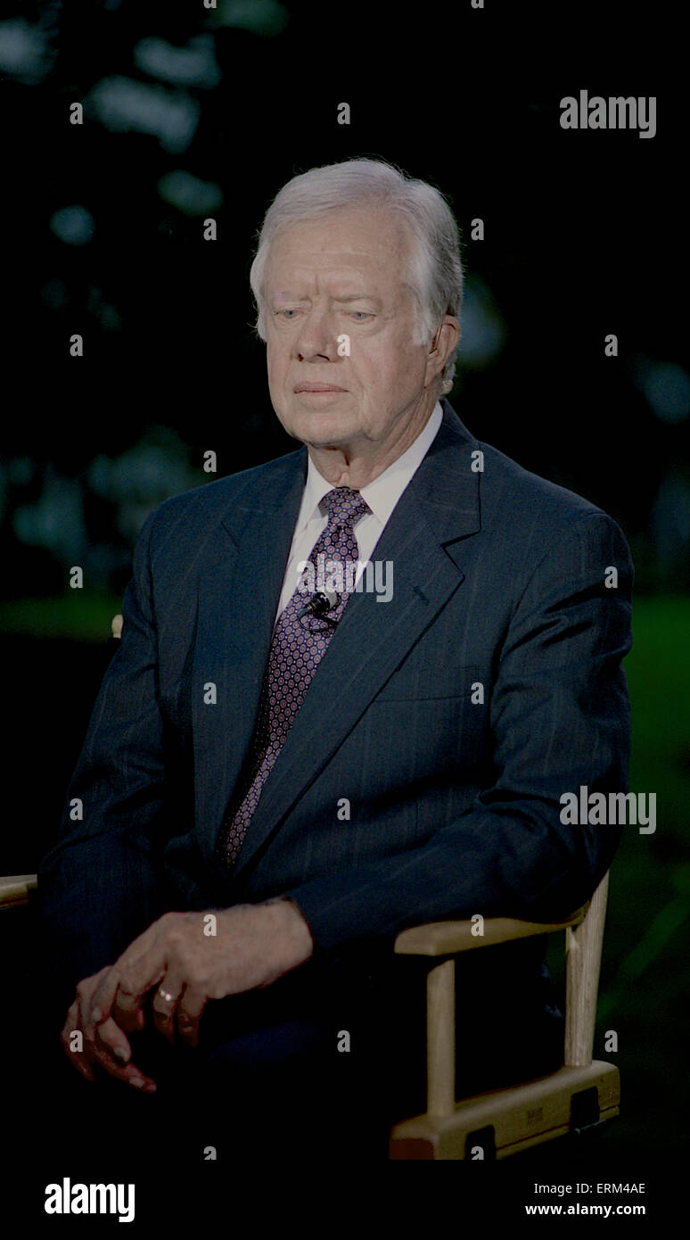 Washington. DC. 9-13-1993 Former President James (Jimmy) Carter sits for a TV interview on the North Lawn of the White House prior to attending the annual Presidents dinner being hosted by current President William Clinton  Credit:Mark Reinstein Stock Photo