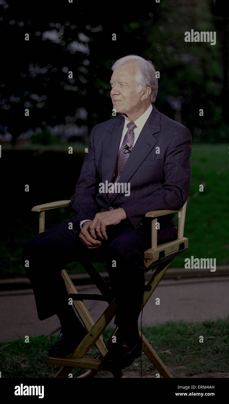 Washington. DC. 9-13-1993 Former President James (Jimmy) Carter sits for a TV interview on the North Lawn of the White House prior to attending the annual Presidents dinner being hosted by current President William Clinton  Credit:Mark Reinstein Stock Photo