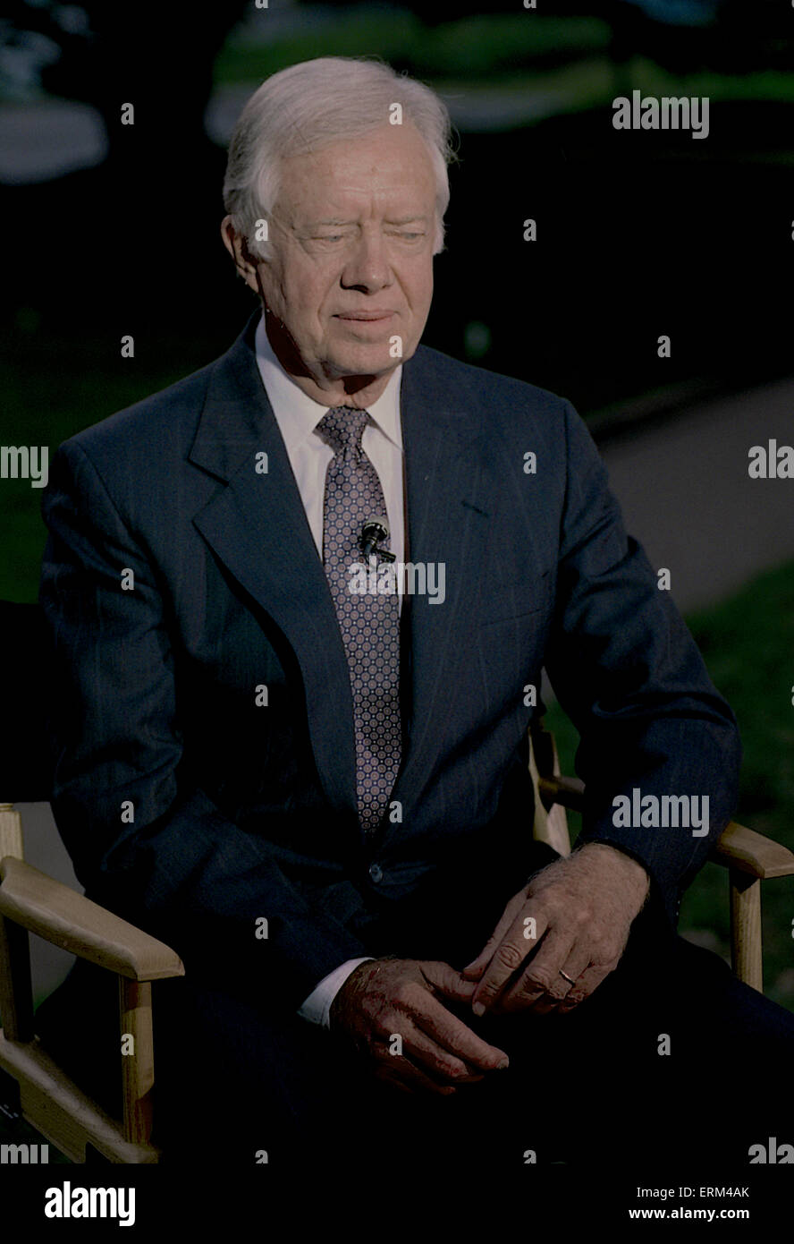 Washington. DC. 9-13-1993 Former President James (Jimmy) Carter sits for a TV interview on the North Lawn of the White House prior to attending the annual Presidents dinner being hosted by current President William Clinton  Credit:Mark Reinstein Stock Photo