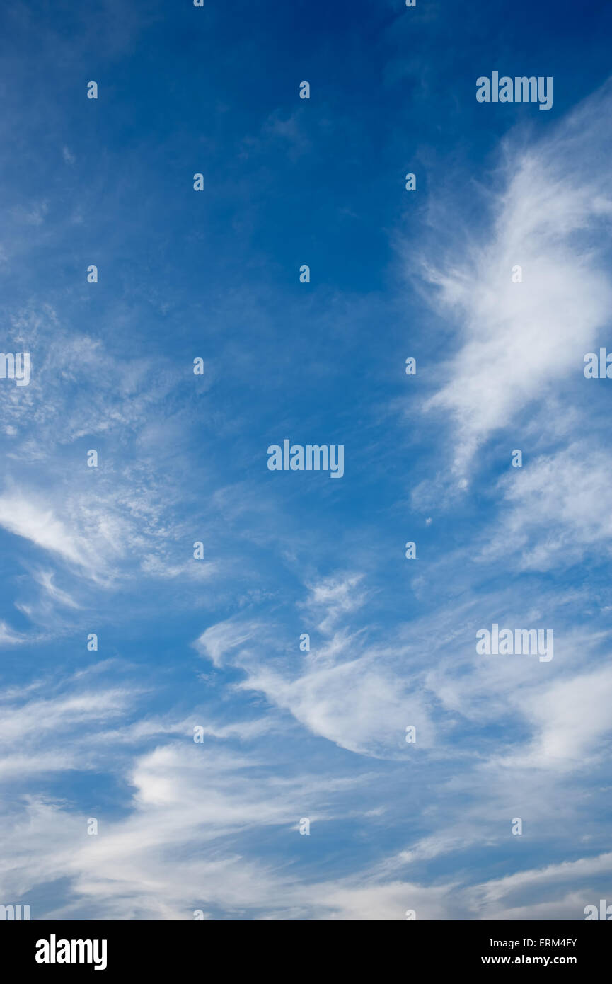 White clouds against blue sky as background Stock Photo - Alamy