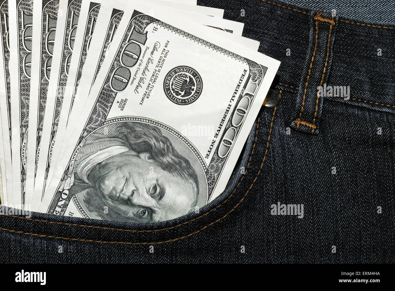 Jeans of which pocket stick out three hundred  dollars Stock Photo