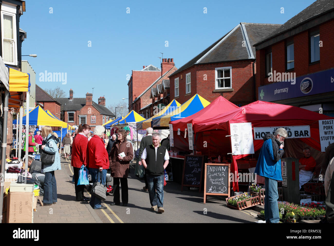 The busy Wednesday street market in Market Drayton, Shropshire Stock Photo Alamy