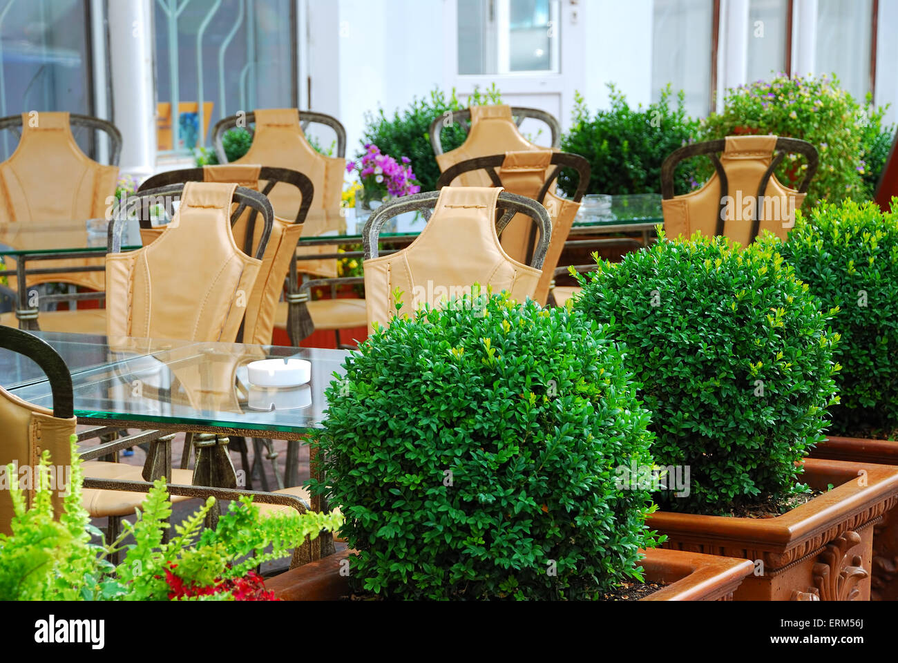 Interior of a summer open-air cafe Stock Photo - Alamy