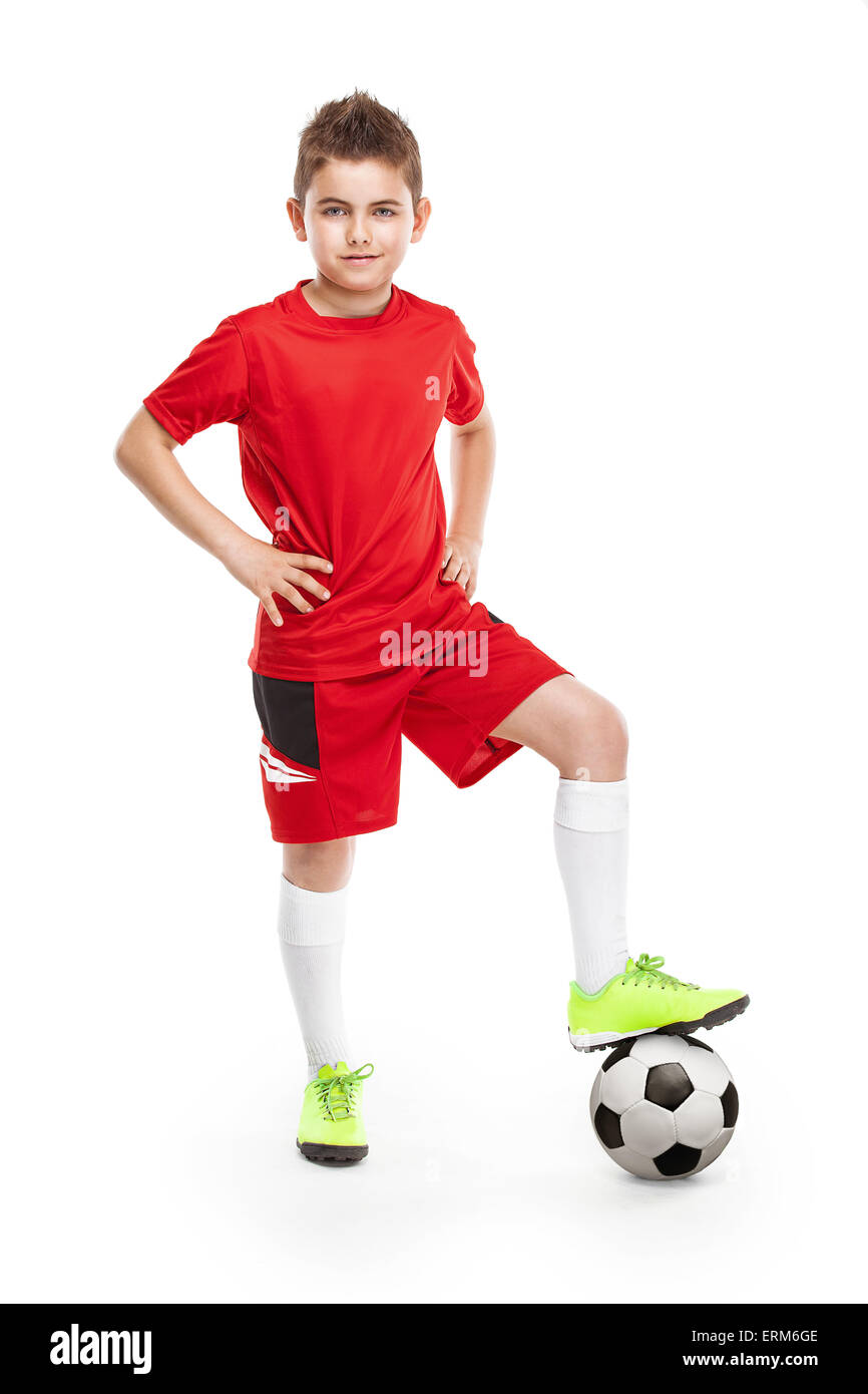 standing young soccer player with football isolated over white