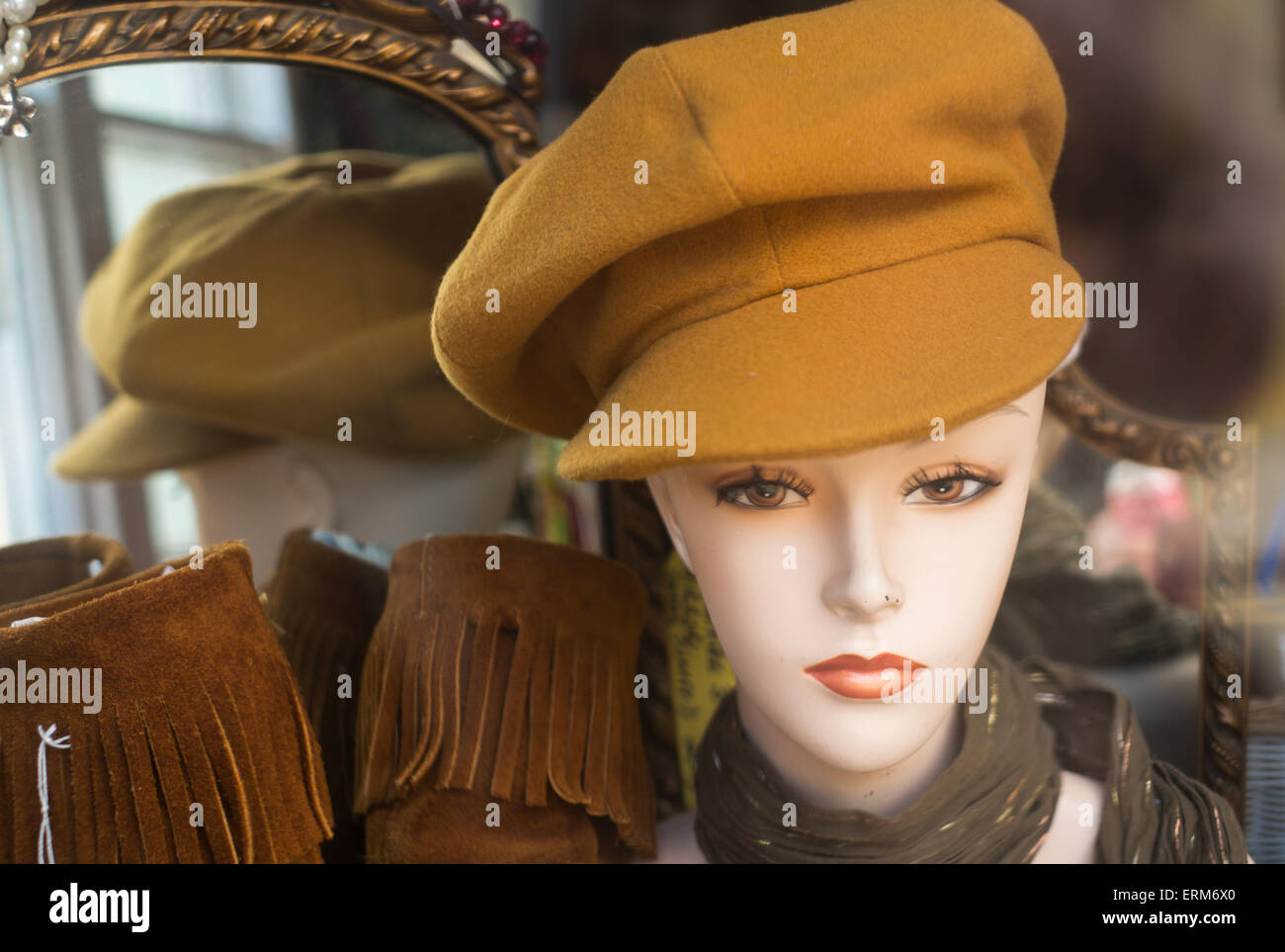 Manikin head wearing 1960's style hat in shop window, Fishguard, Pembrokeshire, Wales Stock
