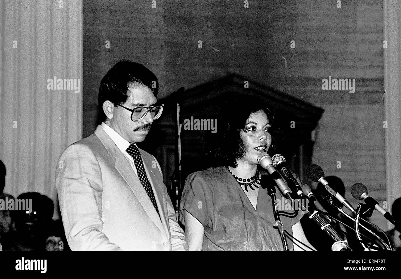 Chicago, Illinois, 2nd August 1986 Nicaraguan President Daniel Ortega speaks to the crowd gathered at Operation  Push. His wife Rosario Murillo who is a polyglot translates for him. ``Nicaragua is willing to negotiate with the United States toward a treaty of peace and friendship,`` Ortega said through an interpreter. ``We are willing to sign a treaty of peace and friendship with the United States immediately.`` Ortega also invited Reagan to visit Nicaragua and meet with top officials as well as the Nicaraguan people.  Credit; Mark Reinstein Stock Photo