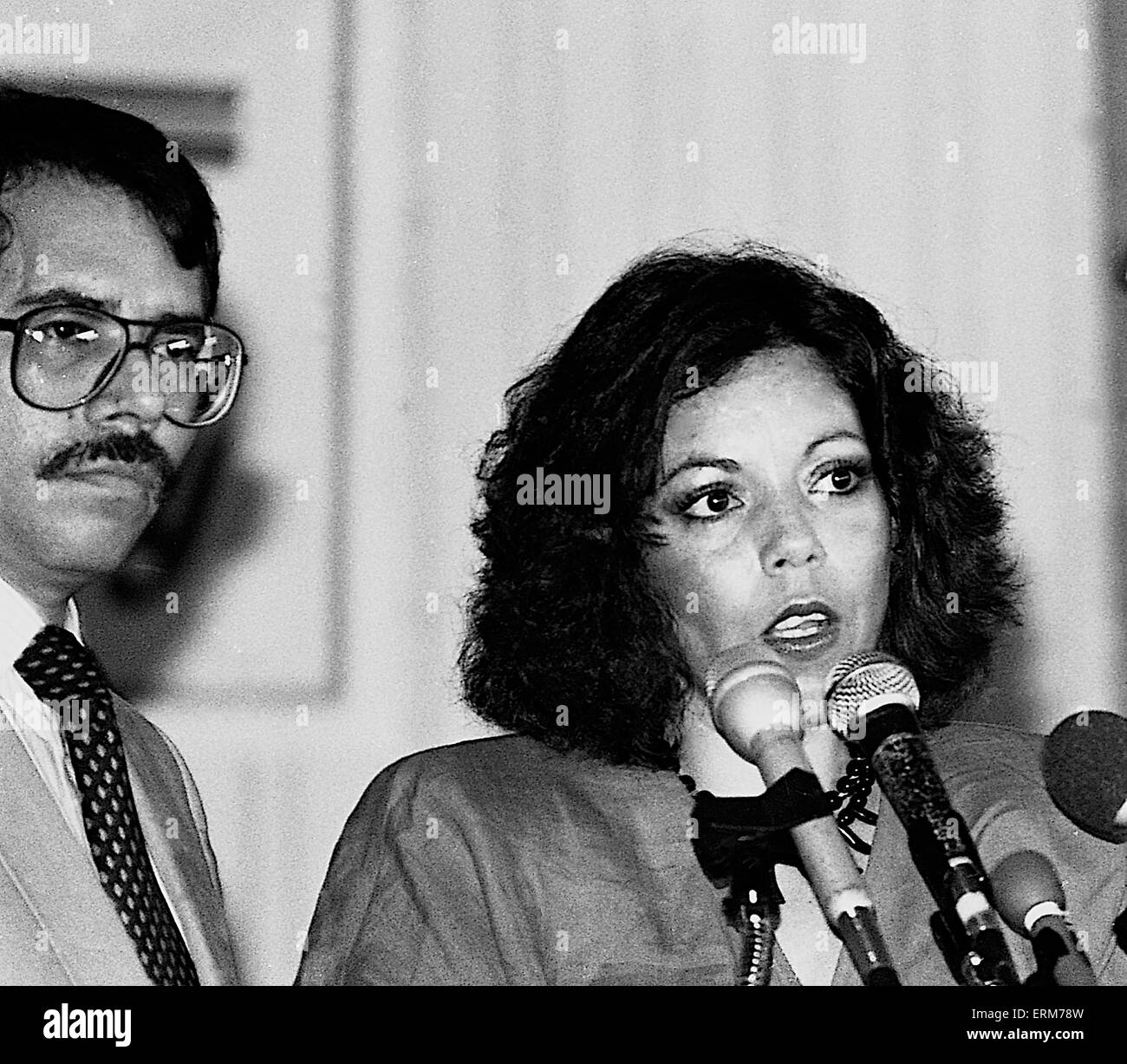 Chicago, Illinois, USA 2nd August 1986 Nicaraguan President Daniel Ortega speaks to the crowd gathered at Operation  Push. His wife Rosario Murillo who is a polyglot translates for him. ``Nicaragua is willing to negotiate with the United States toward a treaty of peace and friendship. We are willing to sign a treaty of peace and friendship with the United States immediately.`` Ortega also invited Reagan to visit Nicaragua and meet with top officials as well as the Nicaraguan people. Credit: Mark Reinstein Stock Photo