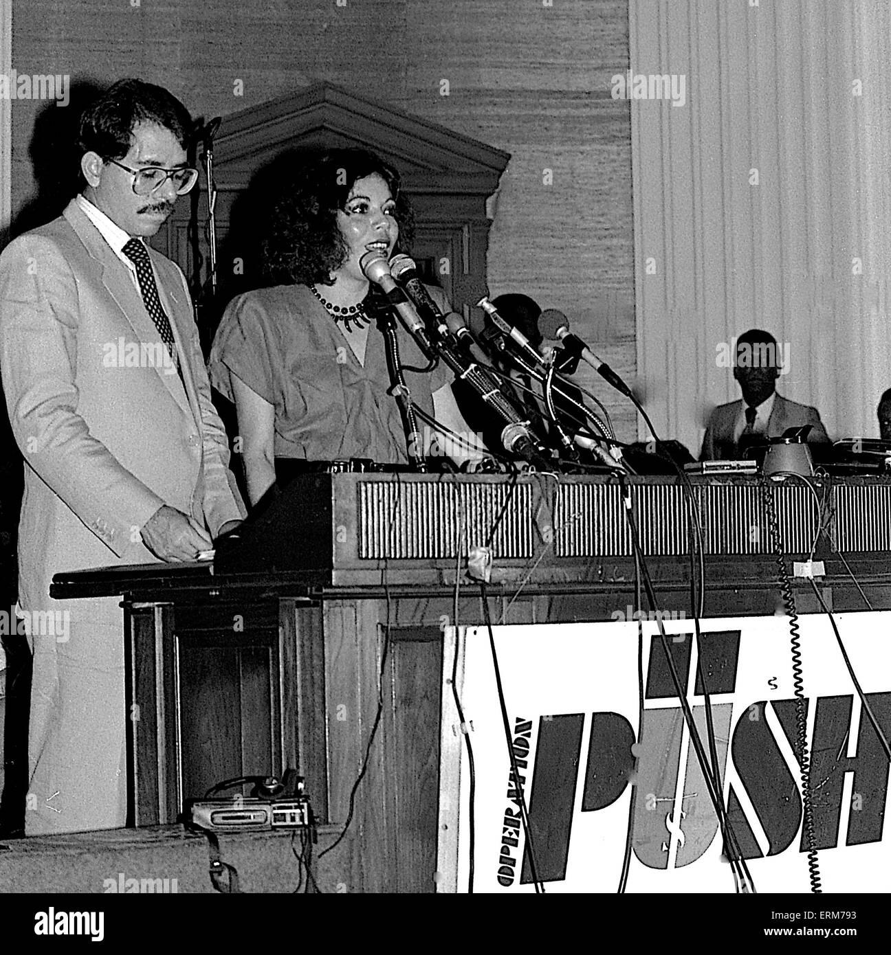 Chicago, Illinois, USA 2nd August 1986 Nicaraguan President Daniel Ortega speaks to the crowd gathered at Operation  Push. His wife Rosario Murillo who is a polyglot translates for him. ``Nicaragua is willing to negotiate with the United States toward a treaty of peace and friendship. We are willing to sign a treaty of peace and friendship with the United States immediately.`` Ortega also invited Reagan to visit Nicaragua and meet with top officials as well as the Nicaraguan people.  Credit: Mark Reinstein Stock Photo