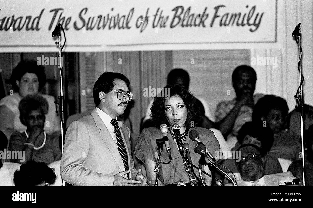 Chicago, Illinois, USA, 2nd August 1986 Nicaraguan President Daniel Ortega speaks to the crowd gathered at Operation Push. His wife Rosario Murillo who is a polyglot translates for him. ``Nicaragua is willing to negotiate with the United States toward a treaty of peace and friendship. We are willing to sign a treaty of peace and friendship with the United States immediately.`` Ortega also invited Reagan to visit Nicaragua and meet with top officials as well as the Nicaraguan people.  Credit: Mark Reinstein Stock Photo