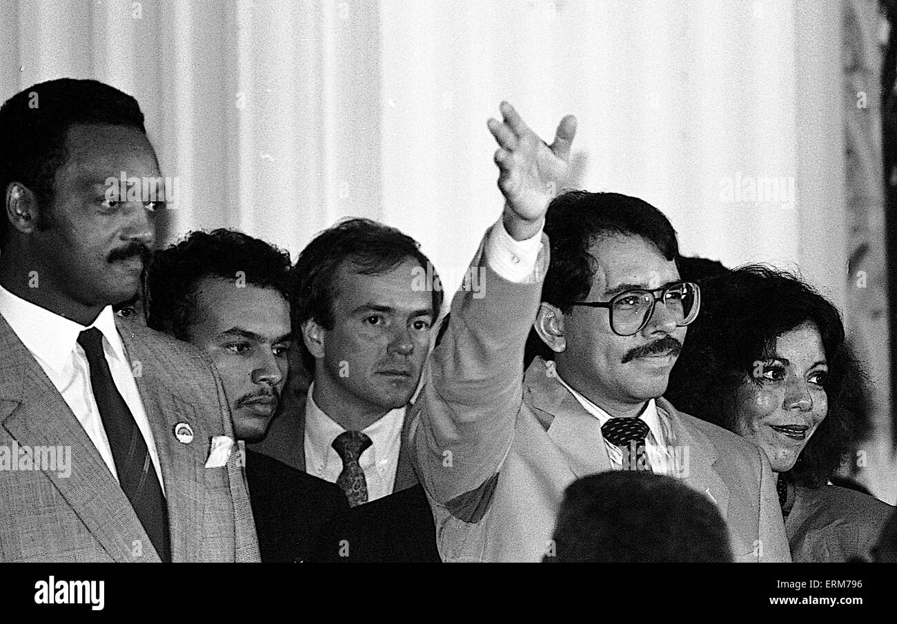Chicago, Illinois, USA 2nd August 1986 Nicaraguan President Daniel Ortega speaks to the crowd gathered at Operation  Push. His wife Rosario Murillo who is a polyglot translates for him. ``Nicaragua is willing to negotiate with the United States toward a treaty of peace and friendship. We are willing to sign a treaty of peace and friendship with the United States immediately.`` Ortega also invited Reagan to visit Nicaragua and meet with top officials as well as the Nicaraguan people.  Credit: Mark Reinstein Stock Photo