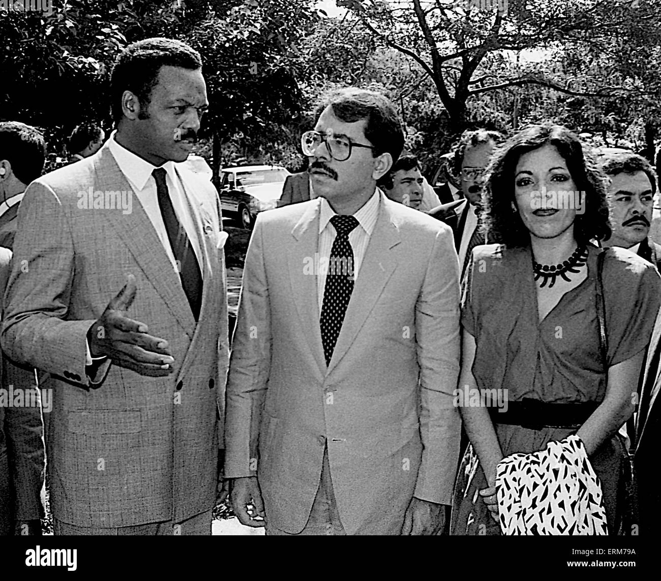 Chicago, Illinois, USA 2nd August  1986 Nicaraguan President Daniel Ortega his wife Rosario  Murillo  with the Rev. Jesse Jackson outside  Operation  Push headquarters. The Nicaraguan FIrst Lady  Rosario Murillo who is a polyglot translates for him. ``Nicaragua is willing to negotiate with the United States toward a treaty of peace and friendship. We are willing to sign a treaty of peace and friendship with the United States immediately.`` Ortega also invited Reagan to visit Nicaragua and meet with top officials as well as the Nicaraguan people.  Credit: Mark Reinstein Stock Photo