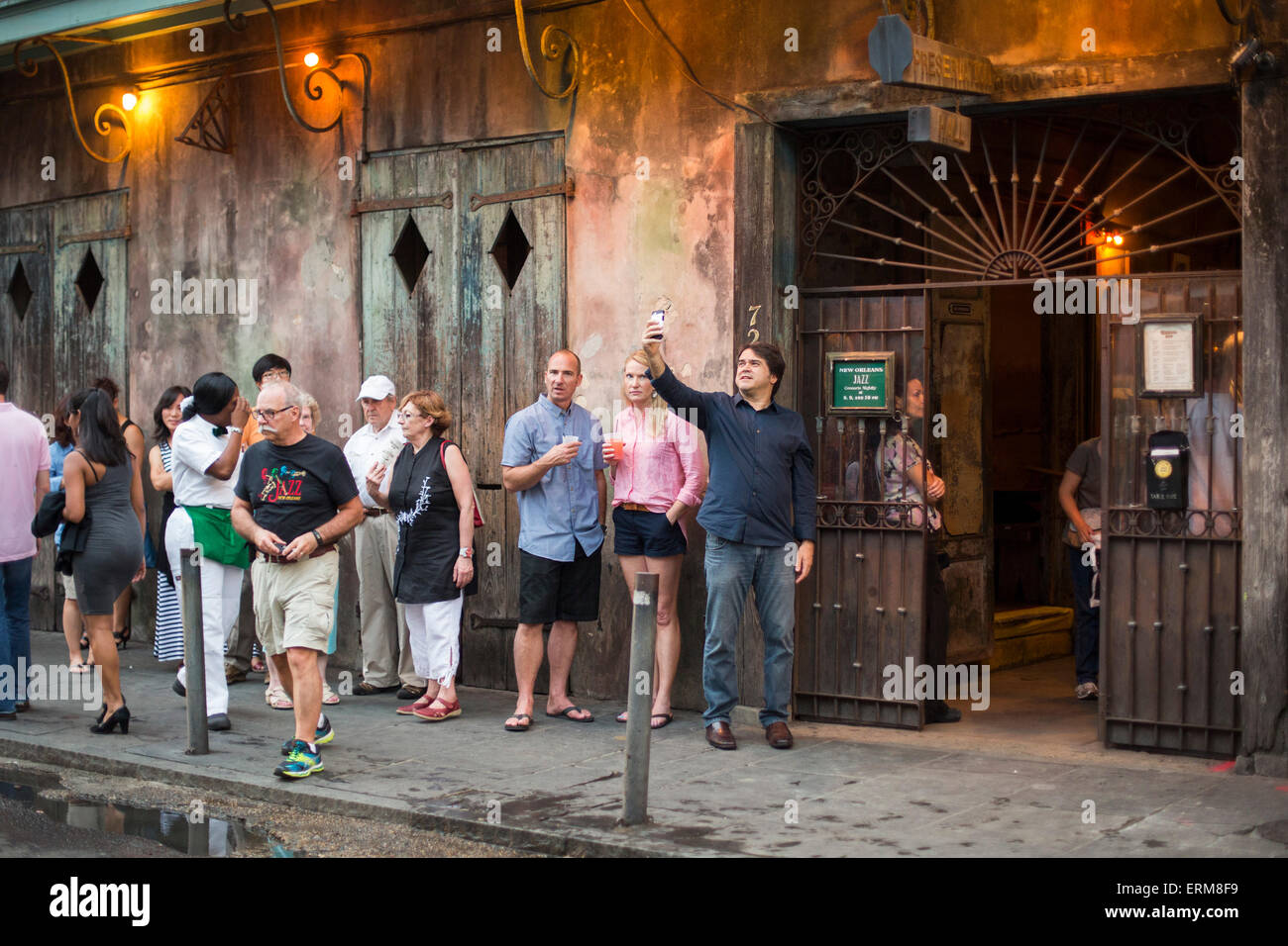 New Orleans, Louisiana - People line up outside Preservation Hall, waiting for a jazz concert to begin. Stock Photo