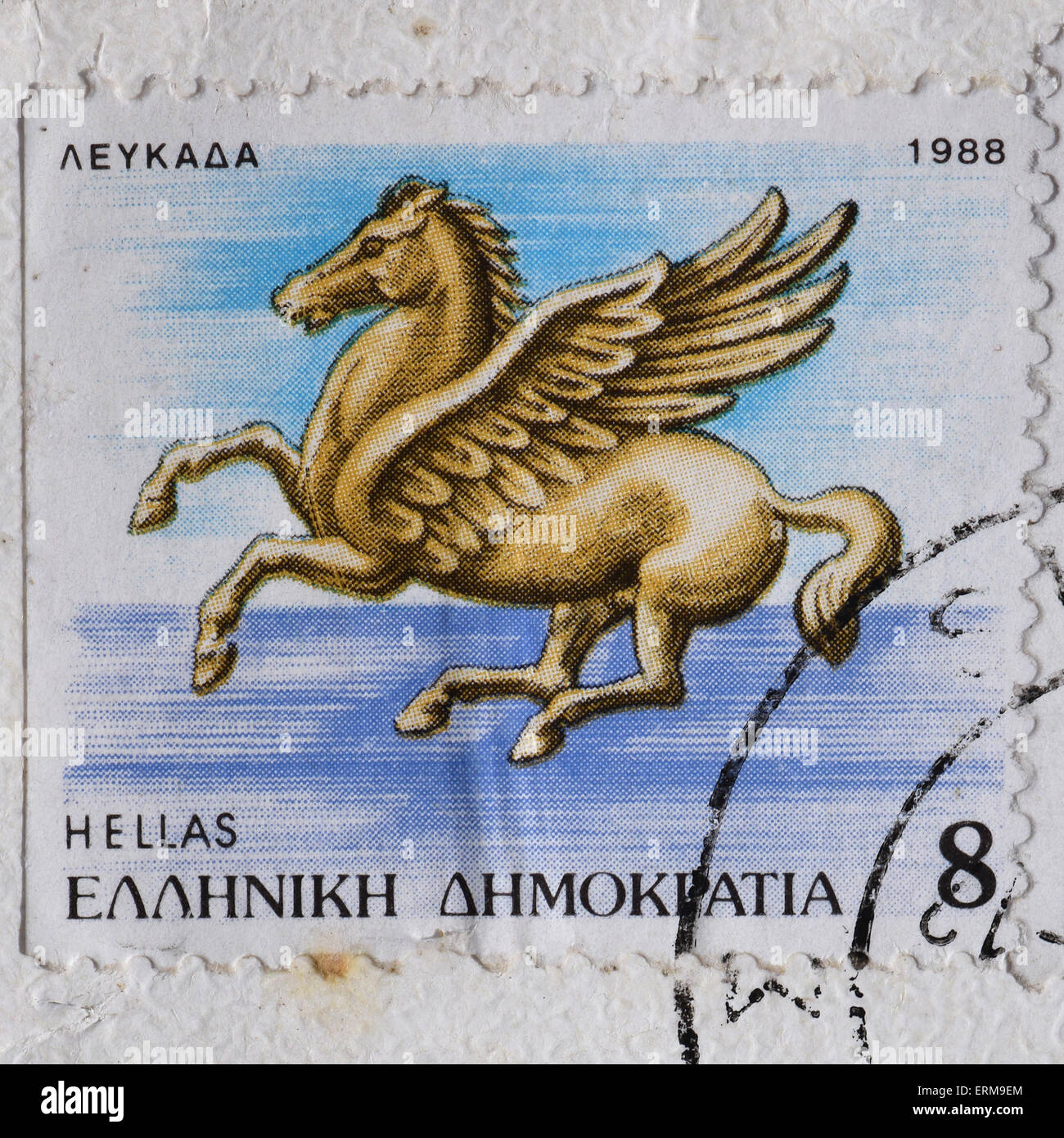 Pegasus flying horse greek mythology winged creature illustration on vintage postage stamp. Stock Photo