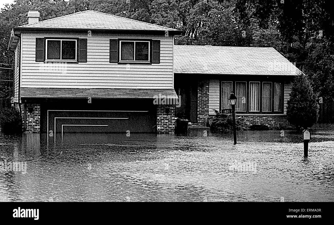 Residents of Mount Prospect, Illinois use sandbags to block flood