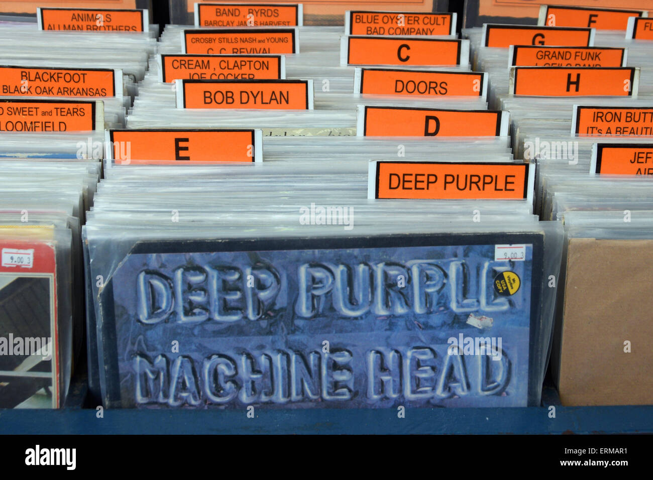 Vintage rock music vinyl records for sale archived in alphabetical Stock Photo: 83426085 - Alamy