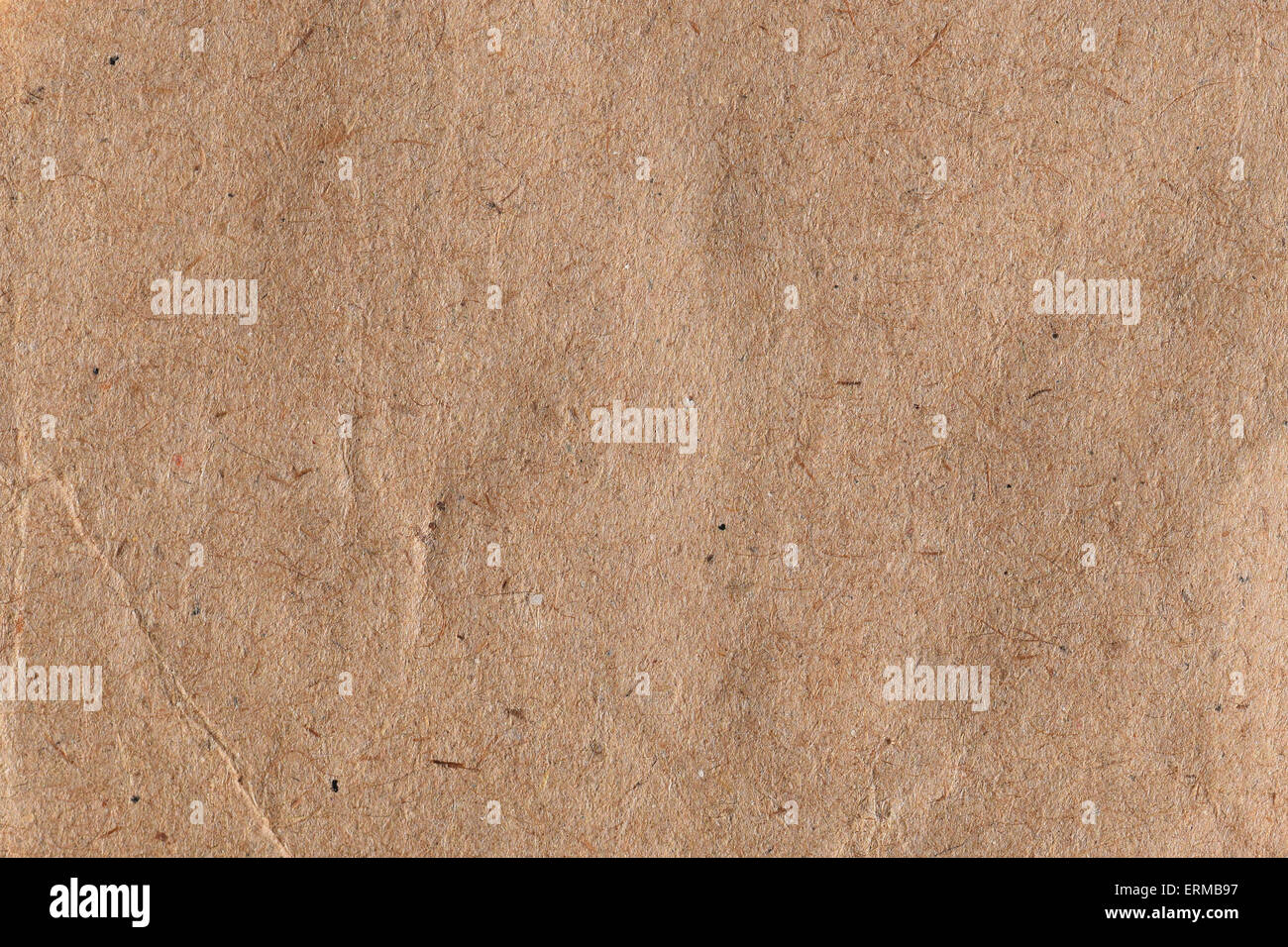 Brown paper with fibers and crease abstract background texture. Stock Photo