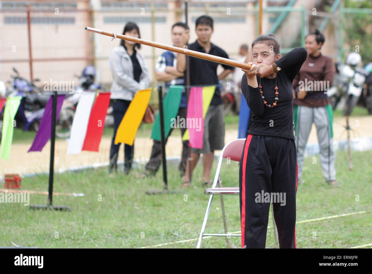 Singkawang, Indonesia. 31st May, 2015. Participants were competing in the race Sumpit (blow gun), during the Gawai Dayak Naik Dango. Sumpit is a traditional weapon Dayak in Kalimantan. © Febrianus M.M Paskalis/Pacific Press/Alamy Live News Stock Photo