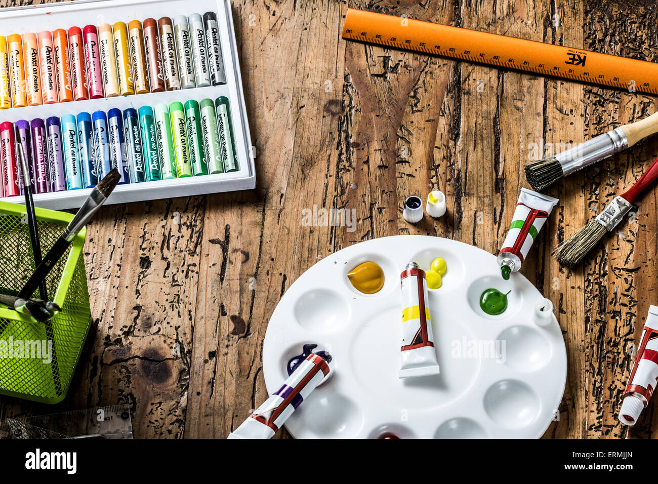 Artists creative work table Stock Photo - Alamy