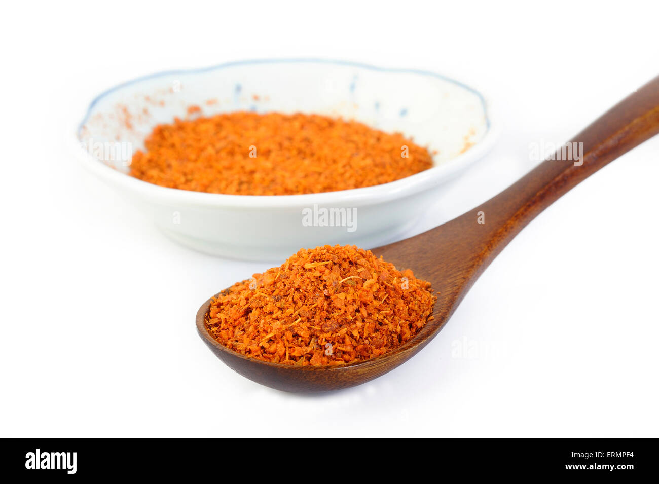cayenne pepper in wooden spoon Stock Photo