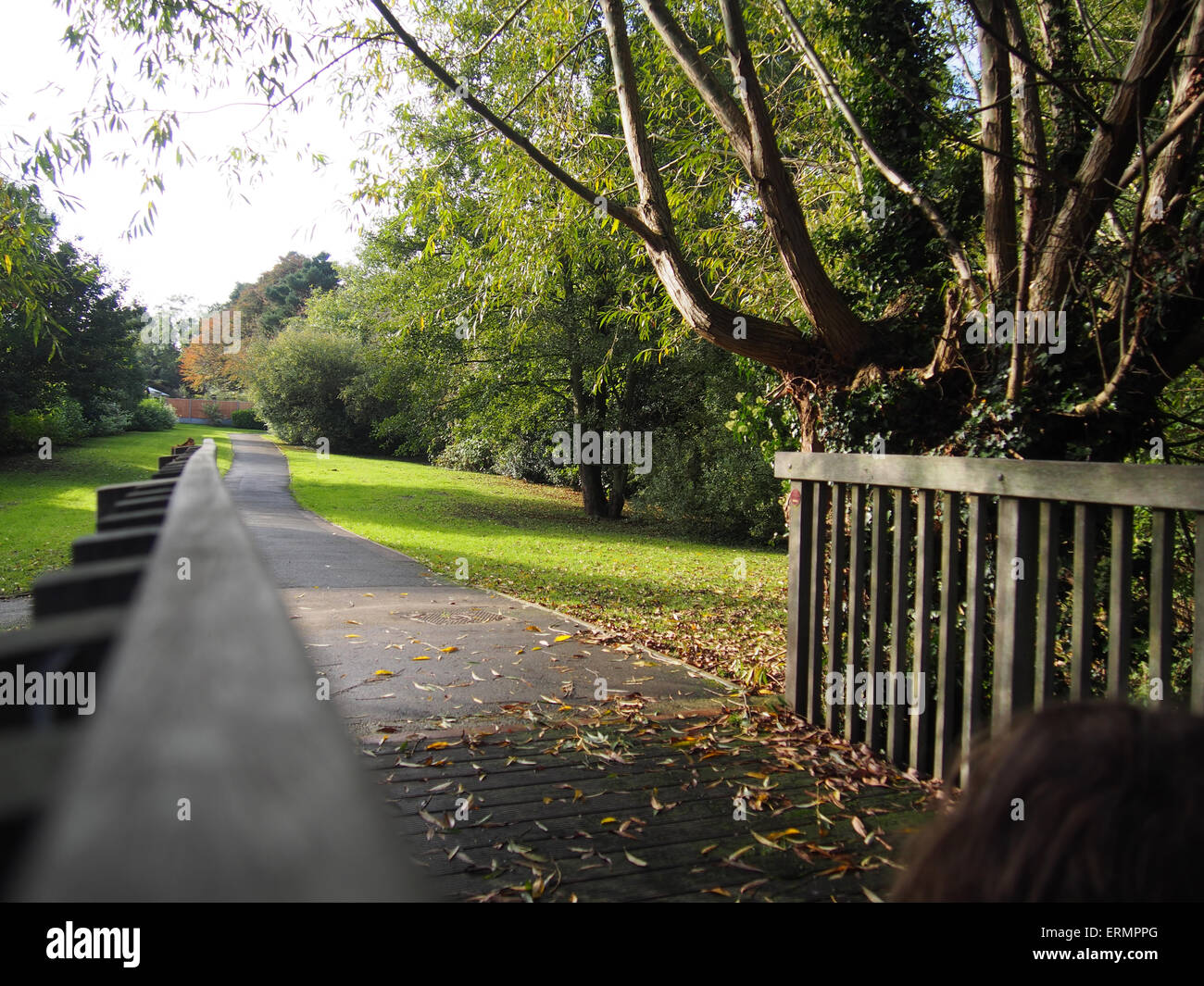 Country path in Uttoxeter - Child crossing bridge Stock Photo