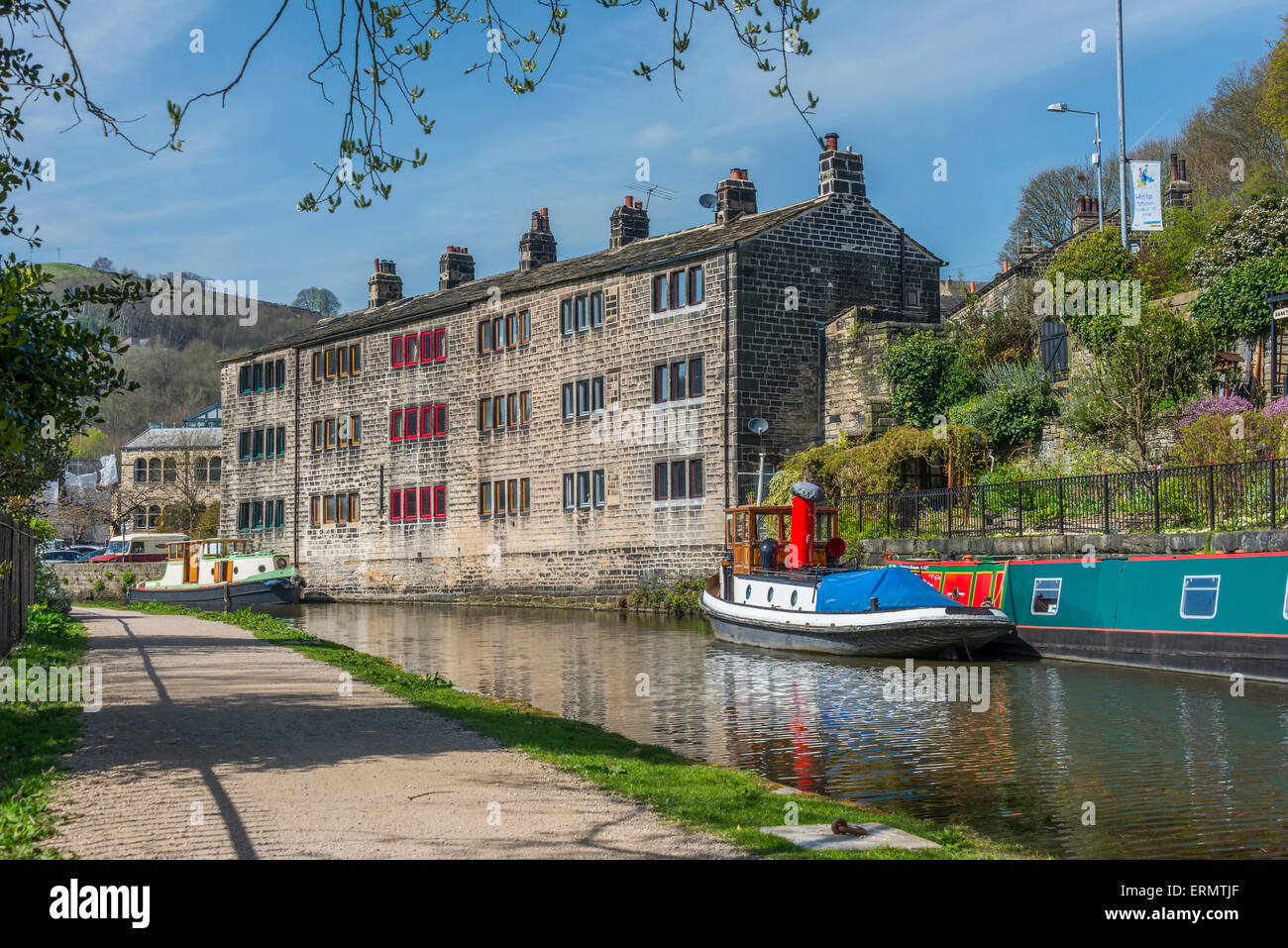 The pretty tourist town of Hebden Bridge in the South Pennine region of West Yorkshire showing steep terraced houses on the surr Stock Photo