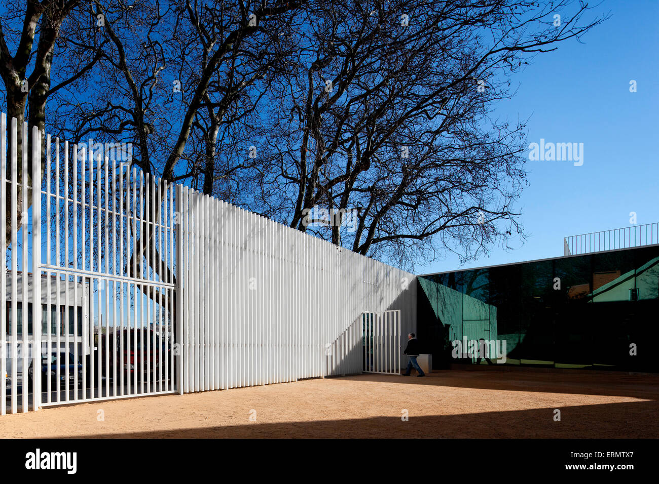 Fenced in schoolyard area. Center School S.Miguel de Nevogilde, Oporto, Portugal. Architect: AVA Architects, 2012. Stock Photo
