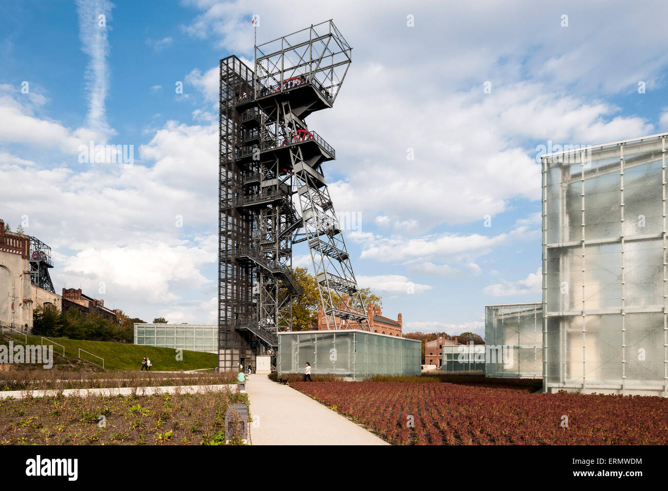 Ensemble of new and historic mining tower in recreational public park. Silesian Museum, Katowice, Poland. Architect: Riegler Rie Stock Photo