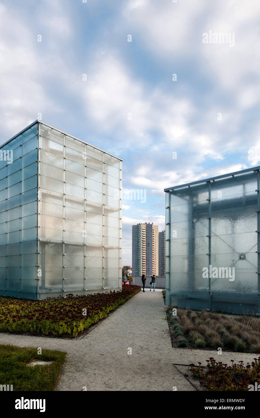 Perspective of glass cube and new walkways. Silesian Museum, Katowice, Poland. Architect: Riegler Riewe Architekten , 2014. Stock Photo