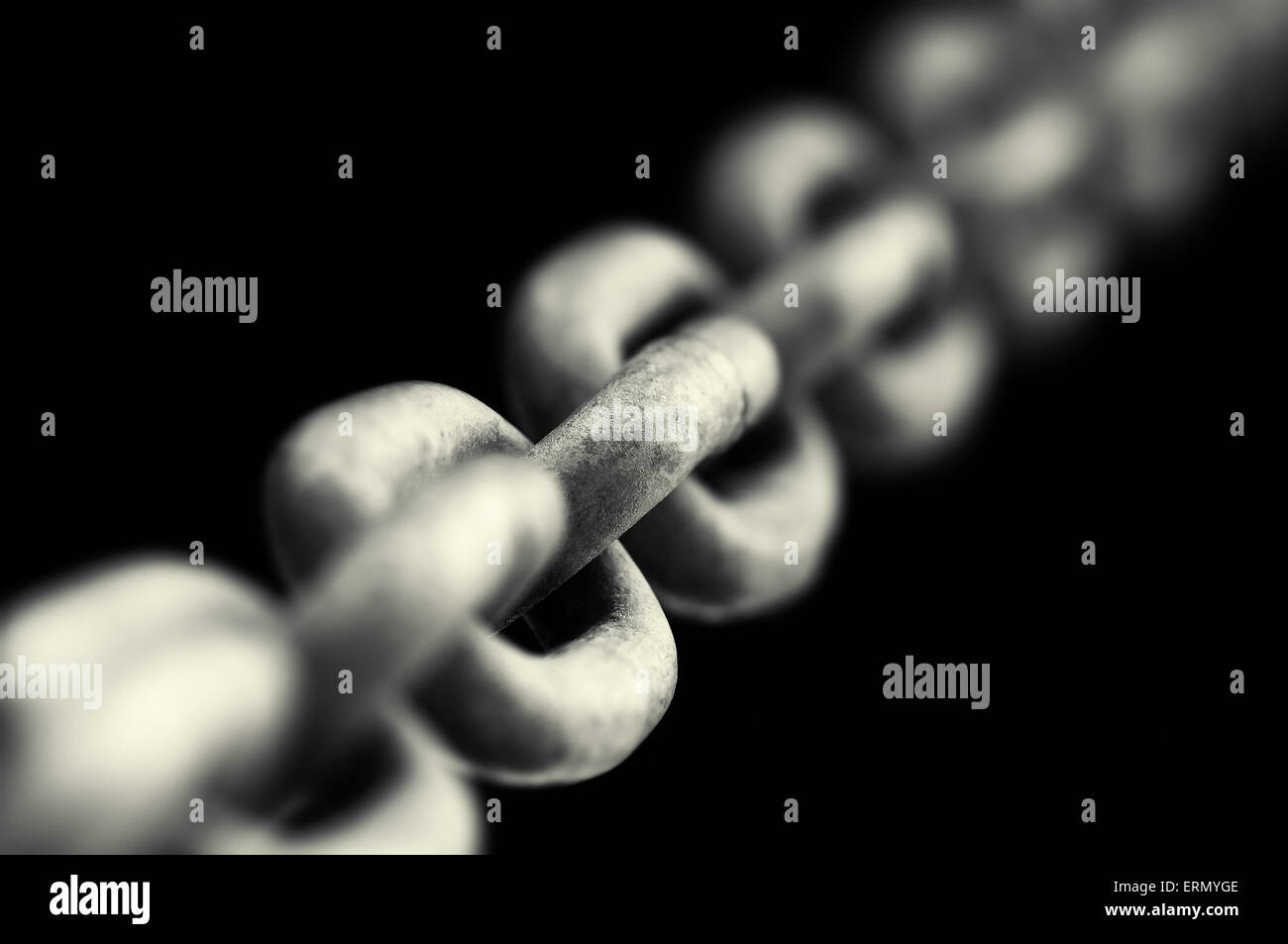 Strong chain black background concept abstract single linked Stock Photo
