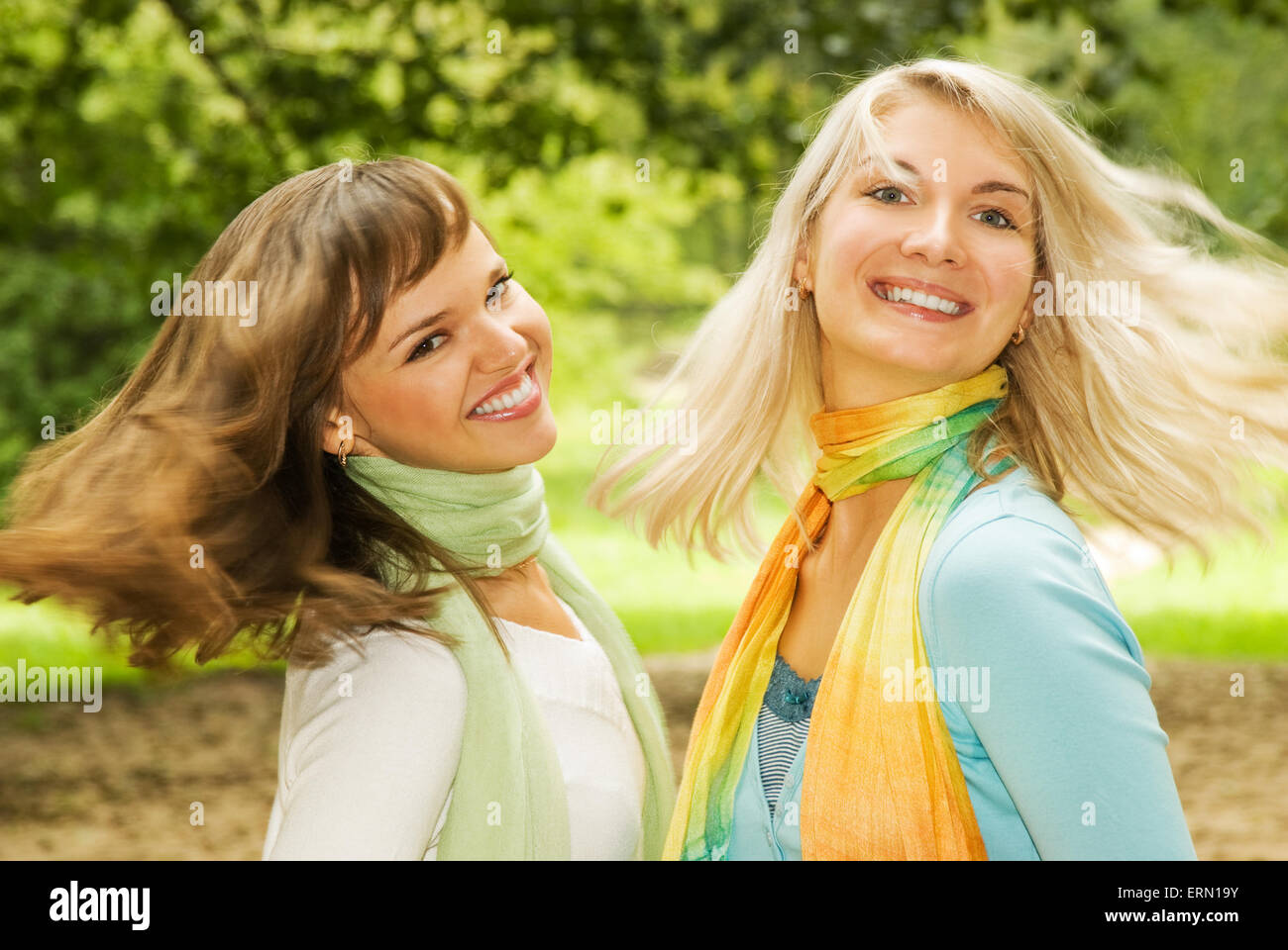 Beautiful young women outdoors Stock Photo - Alamy