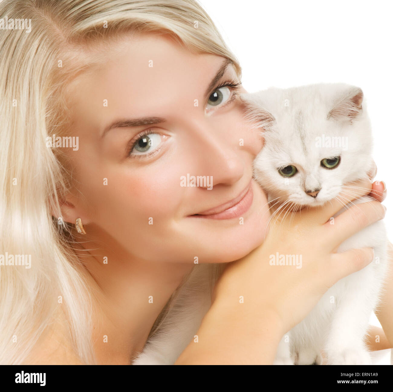 Happy young woman and sad british kitten Stock Photo