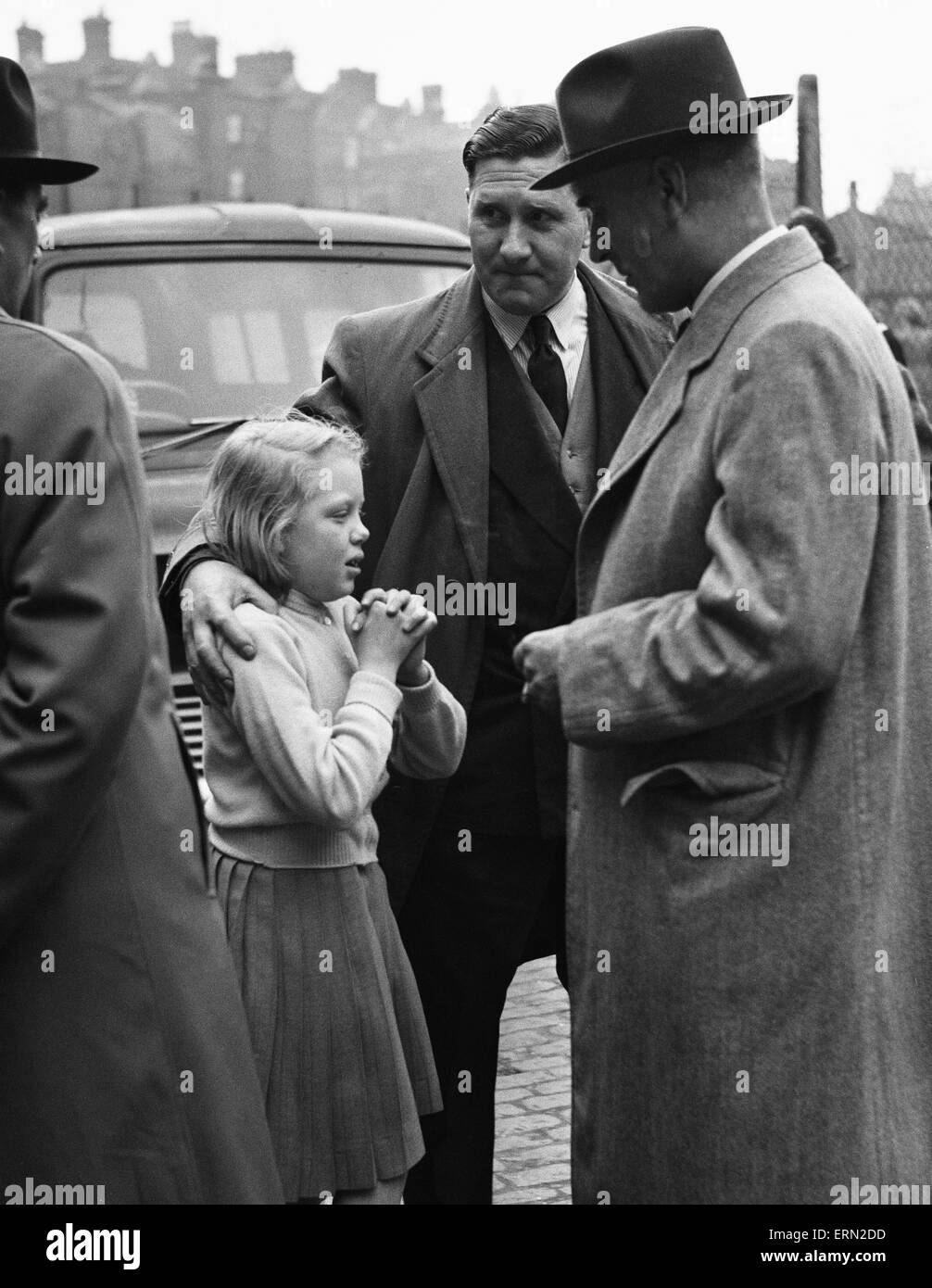 Little Christine Firmston 10 stopped skipping near her home to watch a mail van robbery She had seen the mail van drive up the narrow Mitcham-street Marylebone and stop behind a ' stalled ' car blocking the street. A van raced up behind cutting off any re Stock Photo