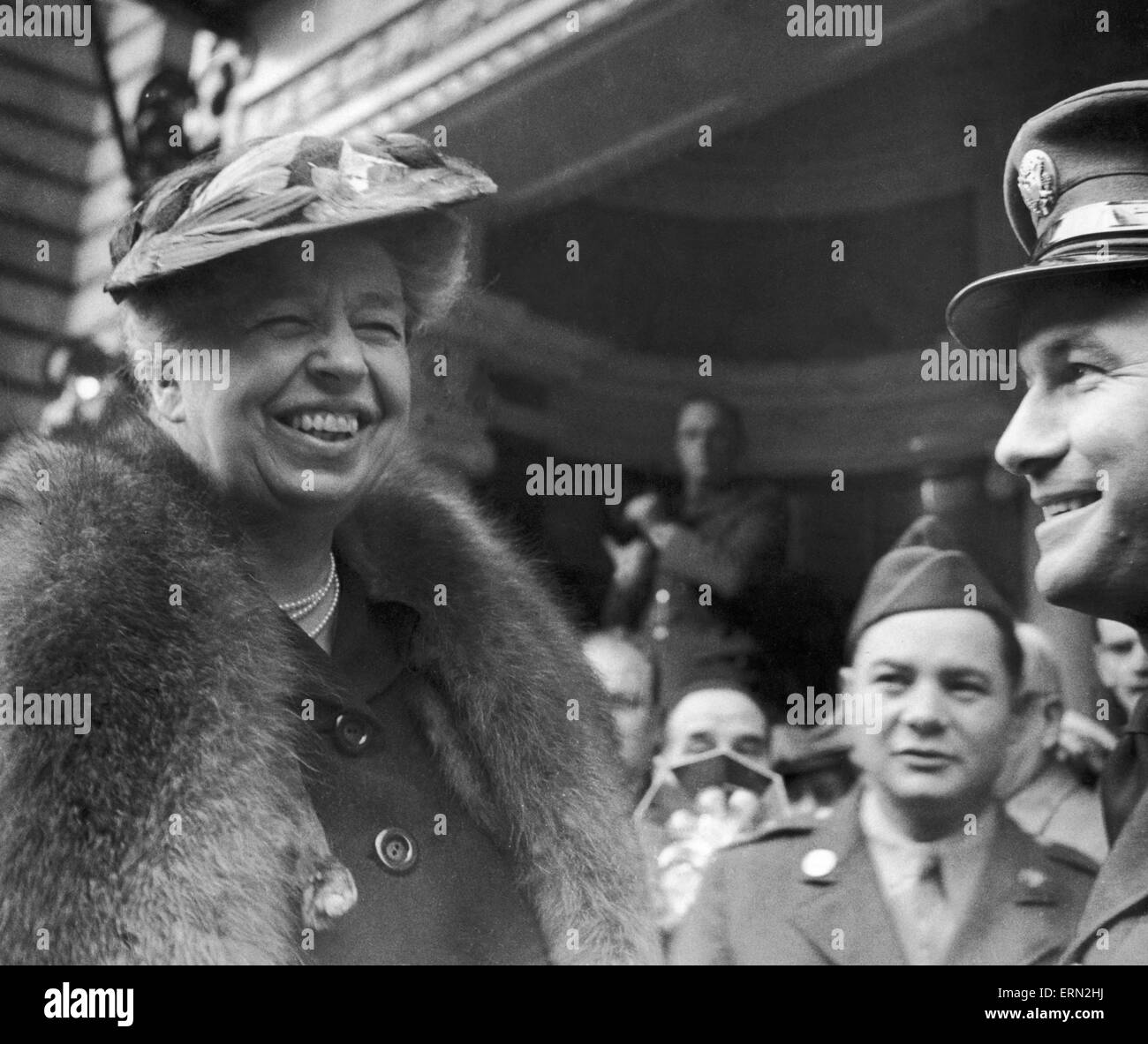 Mrs Eleanor Roosevelt, wife of the President, who is now in the country to see England under war conditions, seen here greeting the American soldiers with a smile on her arrival at the Washington Club, opened recently for members of the US Forces in London. 25th October 1942 Stock Photo