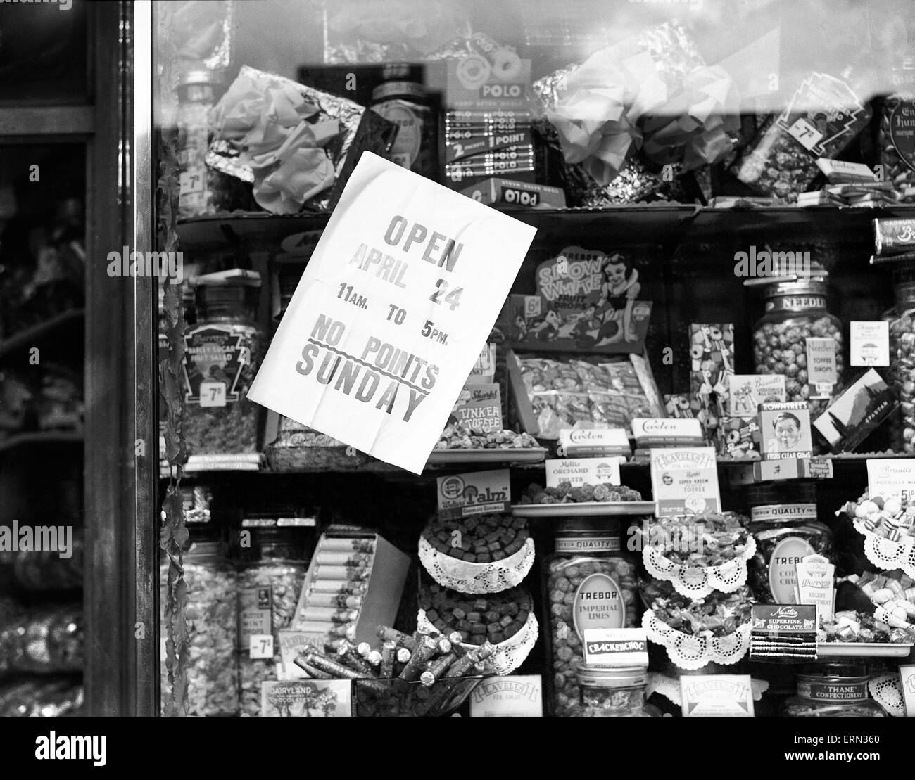 Boys visit a local sweet shop as the end of sweet rationing is enforced. 22nd April 1949. Stock Photo